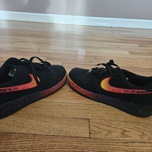 Nike AIR FORCE 1 Black Sneakers with Red and Orange Accents
